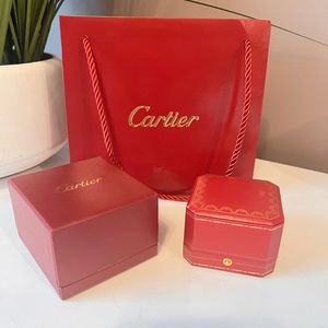 Empty Cartier box with paper bag.
